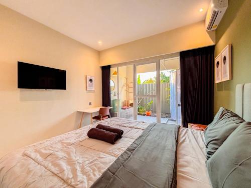 Postel nebo postele na pokoji v ubytování Locus Coliving