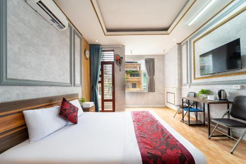 Katil atau katil-katil dalam bilik di King Hotel Saigon