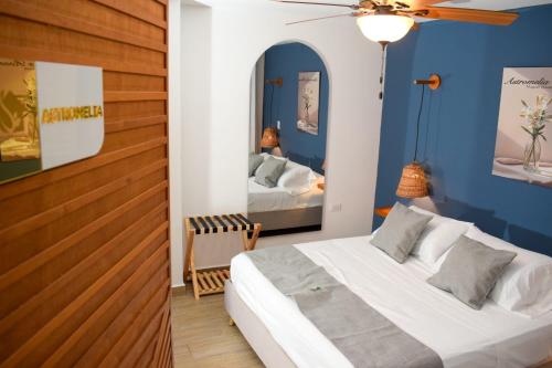 Ένα ή περισσότερα κρεβάτια σε δωμάτιο στο Muguet House Granada