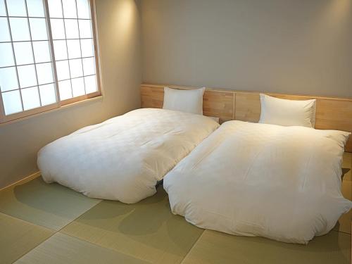 Katil atau katil-katil dalam bilik di 京一軒町家 染 SEN 五条一貫町 Gojo-Ikkannmachi