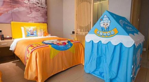 a bedroom with a large bed with a pirate tent at Quanzhou Binhai Hotel in Quanzhou