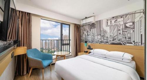 a hotel room with a large bed and a window at City Comfort Inn Wuhan International Expo Center Yongwang in Wuhan