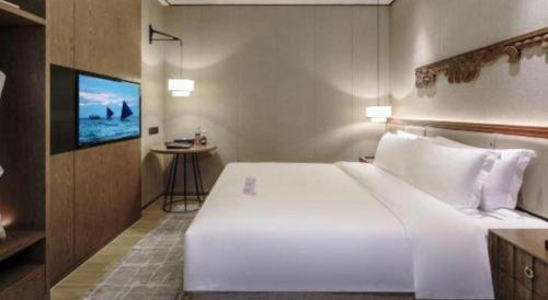 Cama o camas de una habitación en Shenzhen Apex Hotel (Technology Park Branch)