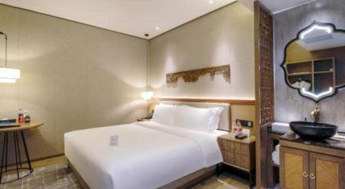 Cama o camas de una habitación en Shenzhen Apex Hotel (Technology Park Branch)