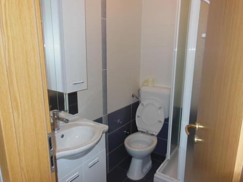Koupelna v ubytování Apartments Maslina