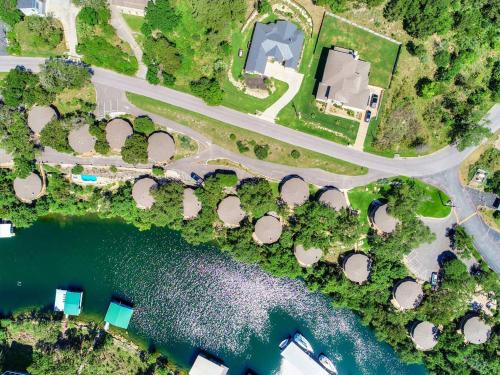 an overhead view of a road and a lake at Treetop Bungalow - Community Pool Hot Tub #18 in Lakeway