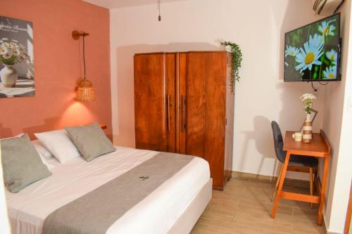 Ένα ή περισσότερα κρεβάτια σε δωμάτιο στο Muguet House Granada