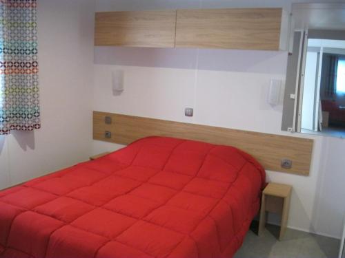 Postel nebo postele na pokoji v ubytování Camping Le Rebau
