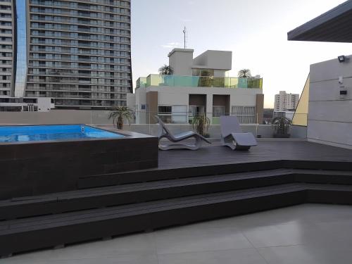 La alberca dentro o cerca de 5B - Apartemento Espectacular