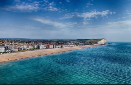 an aerial view of a beach and a city at One bed Apartment with Parking in Seaford