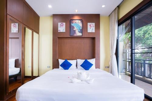 Katil atau katil-katil dalam bilik di Welcome Sea View Pool Villa By Premier