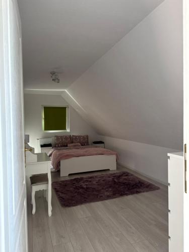 Cama o camas de una habitación en Villa Viktória