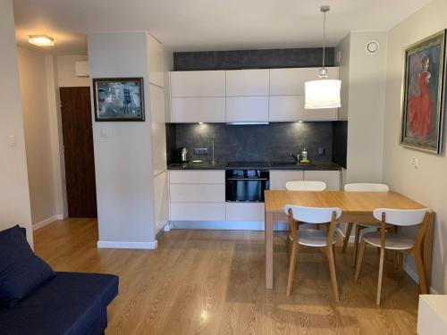 Η κουζίνα ή μικρή κουζίνα στο Apartament Związkowiec