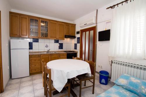 Η κουζίνα ή μικρή κουζίνα στο Apartments Bartul