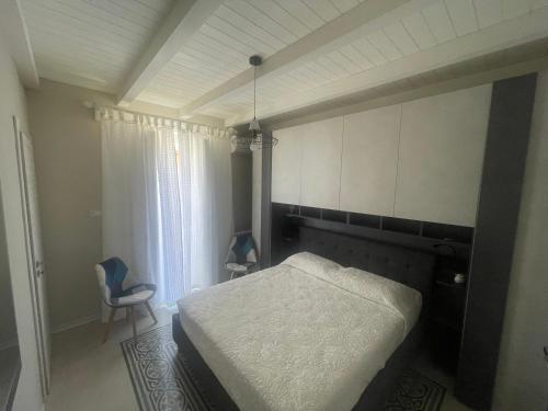 Ένα ή περισσότερα κρεβάτια σε δωμάτιο στο A casa di Giovi