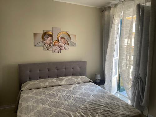 Ένα ή περισσότερα κρεβάτια σε δωμάτιο στο A casa di Giovi