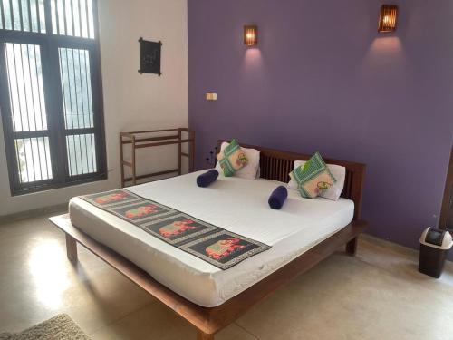 a bedroom with a bed in a room at Vanaro Resort in Yala