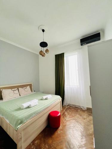 Postel nebo postele na pokoji v ubytování Old House Korolistavi