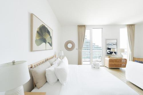 Ένα ή περισσότερα κρεβάτια σε δωμάτιο στο Stylish Studio in Al Barza hosted by Voyage