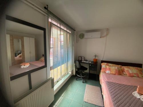 Postel nebo postele na pokoji v ubytování Cozy Corner Zrenjanin