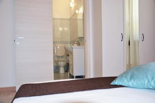 Posteľ alebo postele v izbe v ubytovaní Salenterra B&B (Salento)