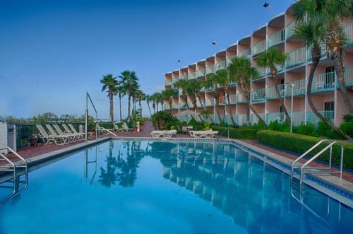 a large swimming pool in front of a hotel at Casa Loma Panama City Beach - Beachfront in Panama City Beach