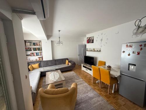 Svetainės erdvė apgyvendinimo įstaigoje Olas Appartment