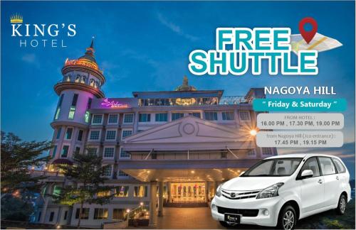a car parked in front of a hotel at King's Hotel Nagoya Batam in Nagoya