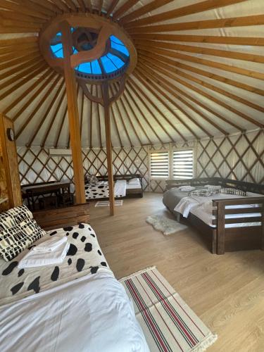 Ein Bett oder Betten in einem Zimmer der Unterkunft Brzozowy Zagajnik