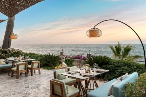a restaurant with a view of the ocean at Swissôtel Living Bodrum in Bodrum City