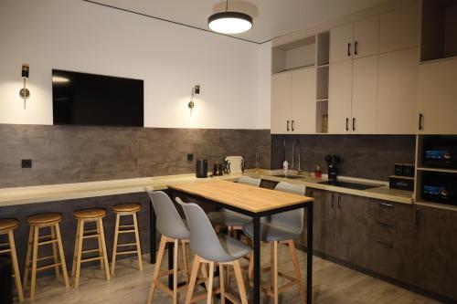 Η κουζίνα ή μικρή κουζίνα στο WoW Hostel Федора Солодовникова 21Е