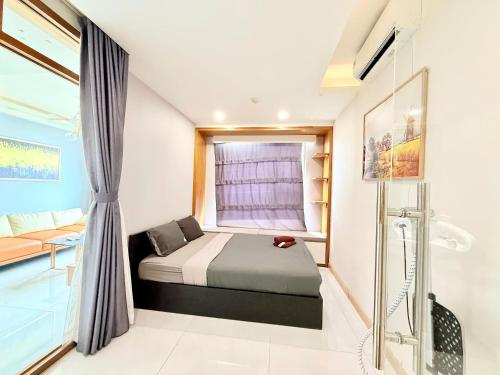 Ένα ή περισσότερα κρεβάτια σε δωμάτιο στο Saigon CBD Apartment - Infinity Pool