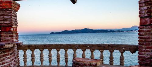 a view of the ocean from a balcony at Marina Smir Hotel & Spa in M'diq
