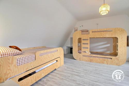 Postel nebo postele na pokoji v ubytování Les maisons de l'if - le cottage