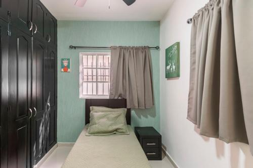 Letto o letti in una camera di 6 Bedrooms Close to the Sea Puerto Plata Center