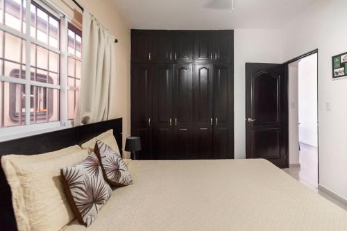 Letto o letti in una camera di 6 Bedrooms Close to the Sea Puerto Plata Center