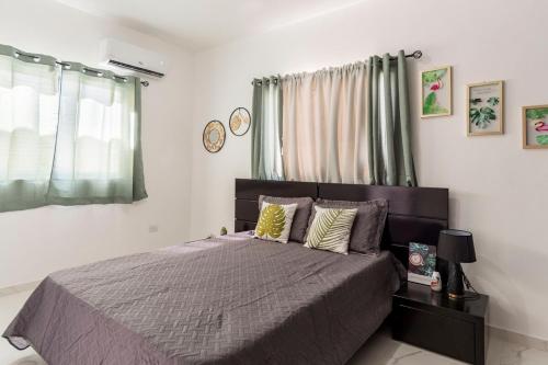 Letto o letti in una camera di 6 Bedrooms Close to the Sea Puerto Plata Center