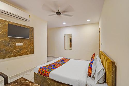 Katil atau katil-katil dalam bilik di FabHotel Golden Rivaah
