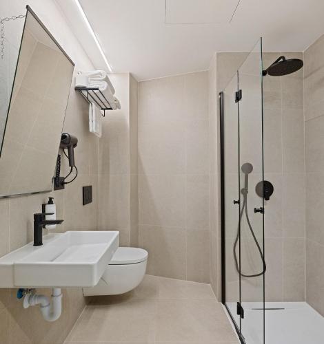 Koupelna v ubytování Hotel Avenida