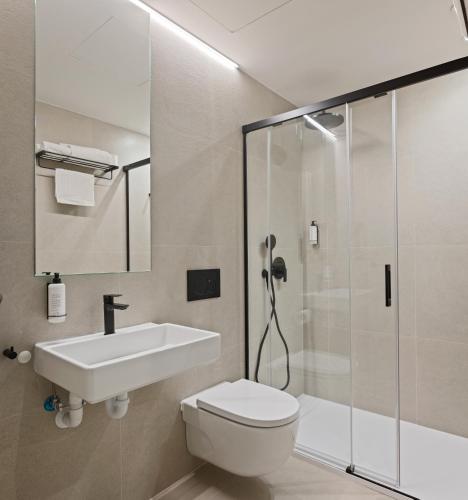 Koupelna v ubytování Hotel Avenida