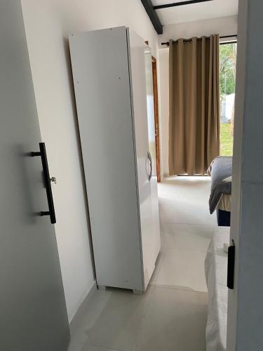 a room with a door open to a bedroom at Alojamiento de Samber Nuevo y Moderno in San Bernardino