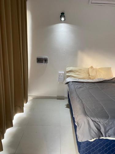 a bedroom with a bed in a room at Alojamiento de Samber Nuevo y Moderno in San Bernardino