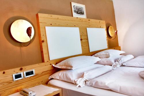 Postel nebo postele na pokoji v ubytování Hotel La Majun
