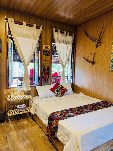 Ένα ή περισσότερα κρεβάτια σε δωμάτιο στο Cozy Haven