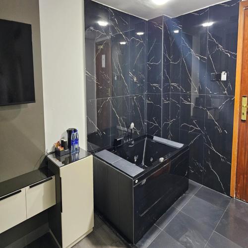 Bagno di Belvilla Royal Tulip Sharjah Aparthotel