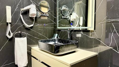 Bagno di Belvilla Royal Tulip Sharjah Aparthotel