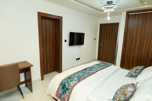 Katil atau katil-katil dalam bilik di Oasis Suites Guzape