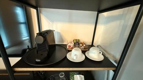 Kemudahan buat kopi dan teh di Cozy Studios Barlad