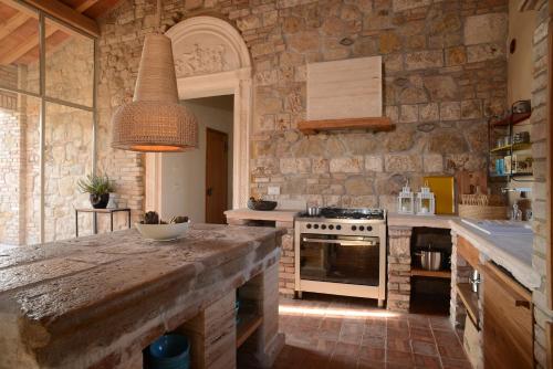 Η κουζίνα ή μικρή κουζίνα στο Tuscany Forever Premium Apartments