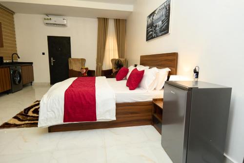 Katil atau katil-katil dalam bilik di Oasis Suites Guzape